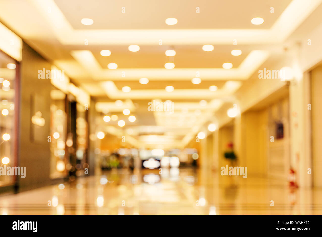 Luxury department store shopping mall interior, abstract defocused blur