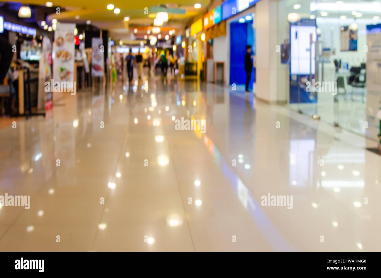Blurred image of shopping mall and people walking for background usage  Sale banner in shop window Stock Photo  Alamy