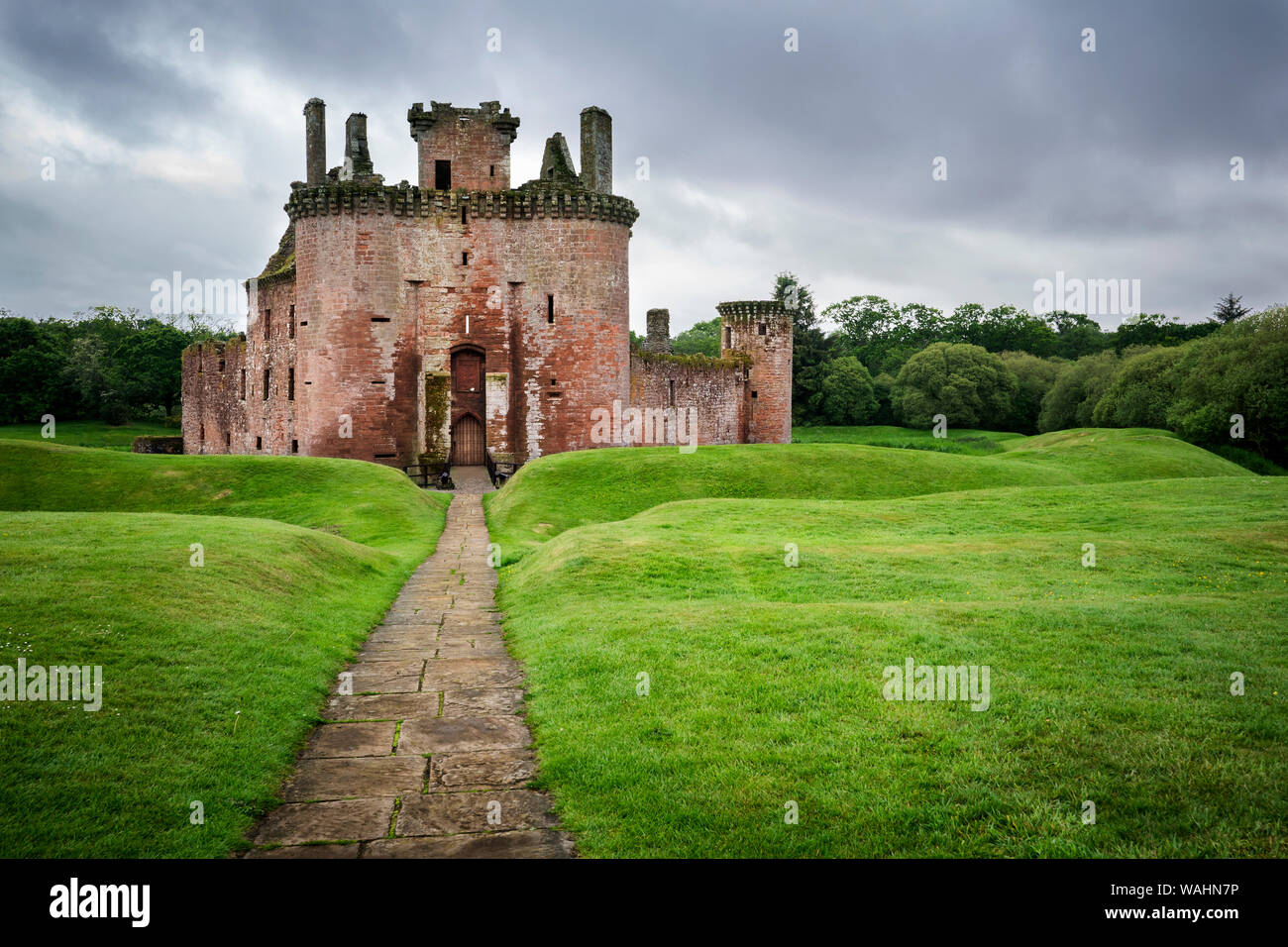 Front view of double moated triangular Caerlaverock Castle in southern Scotland, Dumfries, UK Stock Photo