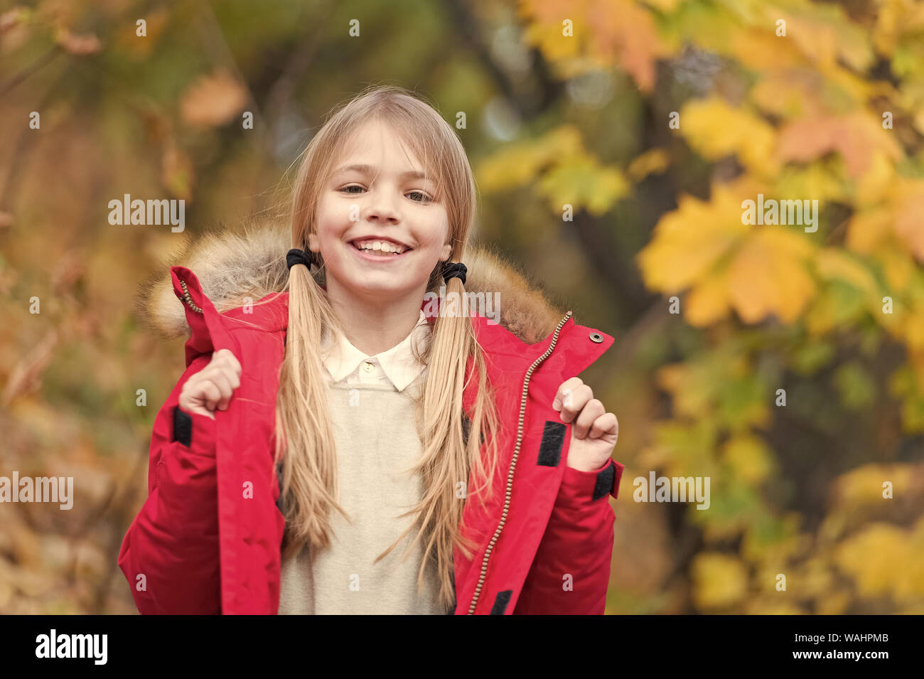 Happy little girl wear autumn fashion. Happy little girl smile outdoor ...