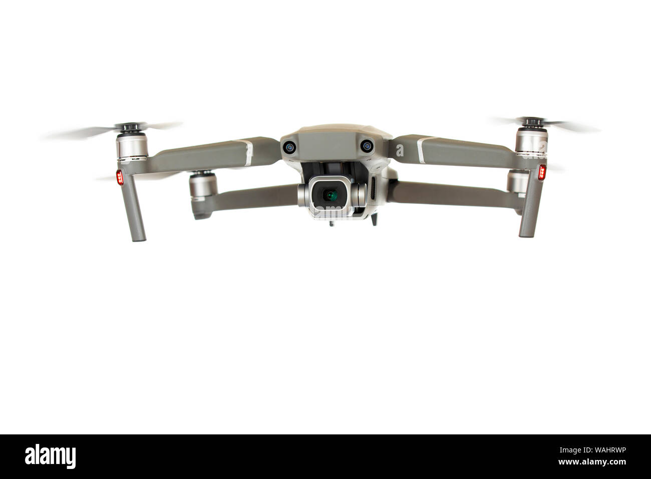 Professional UAV or Drone hovering isolated on a white background Stock Photo