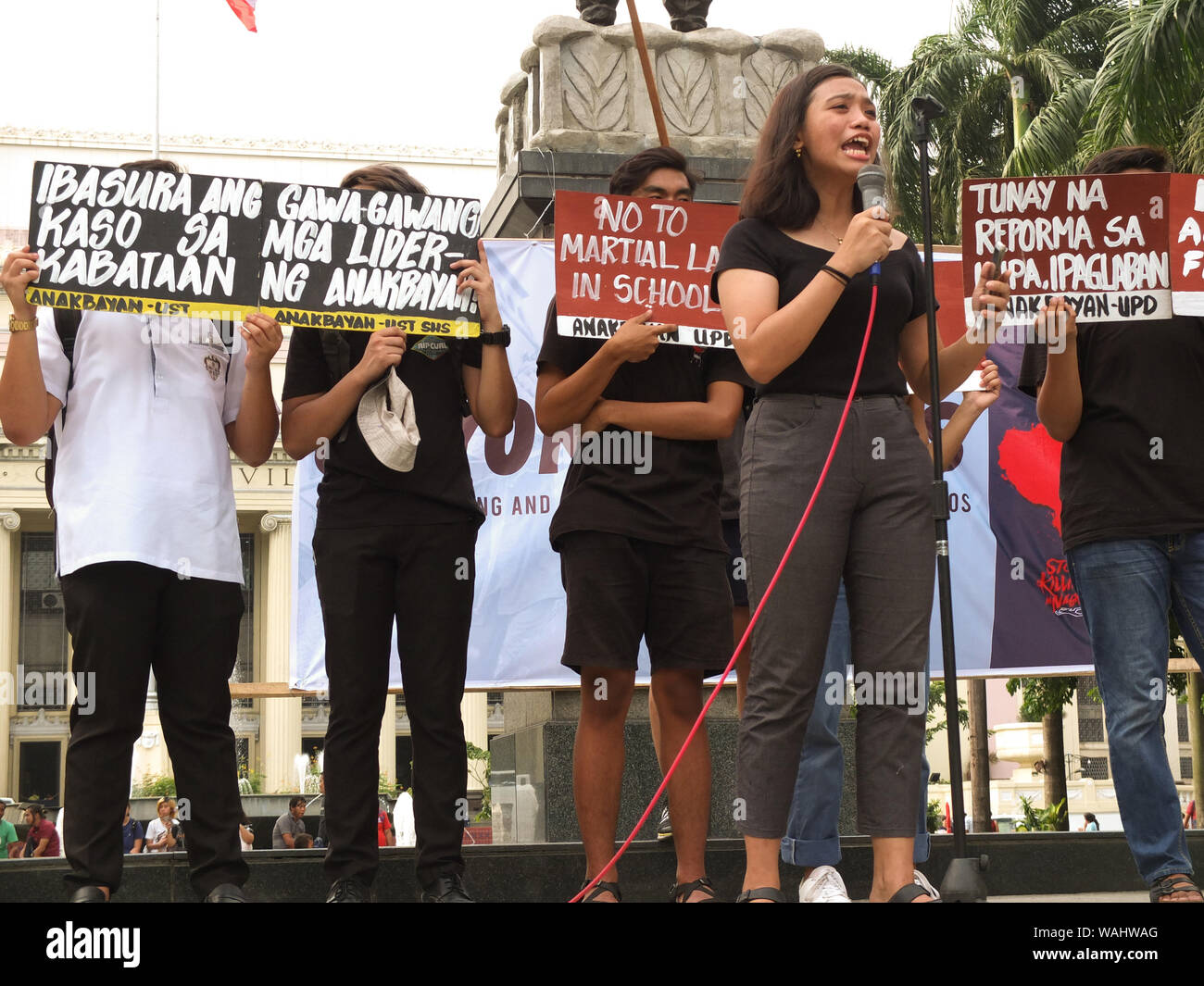 Student protesters hold placards to air their grievances during the demonstration.Families of slain victims of alleged summary killings at Negros province staged a Protest rally at Liwasang Bonifacio in Manila during The National Day of Mourning & Solidarity to call for an end to the killings in the region. Stock Photo