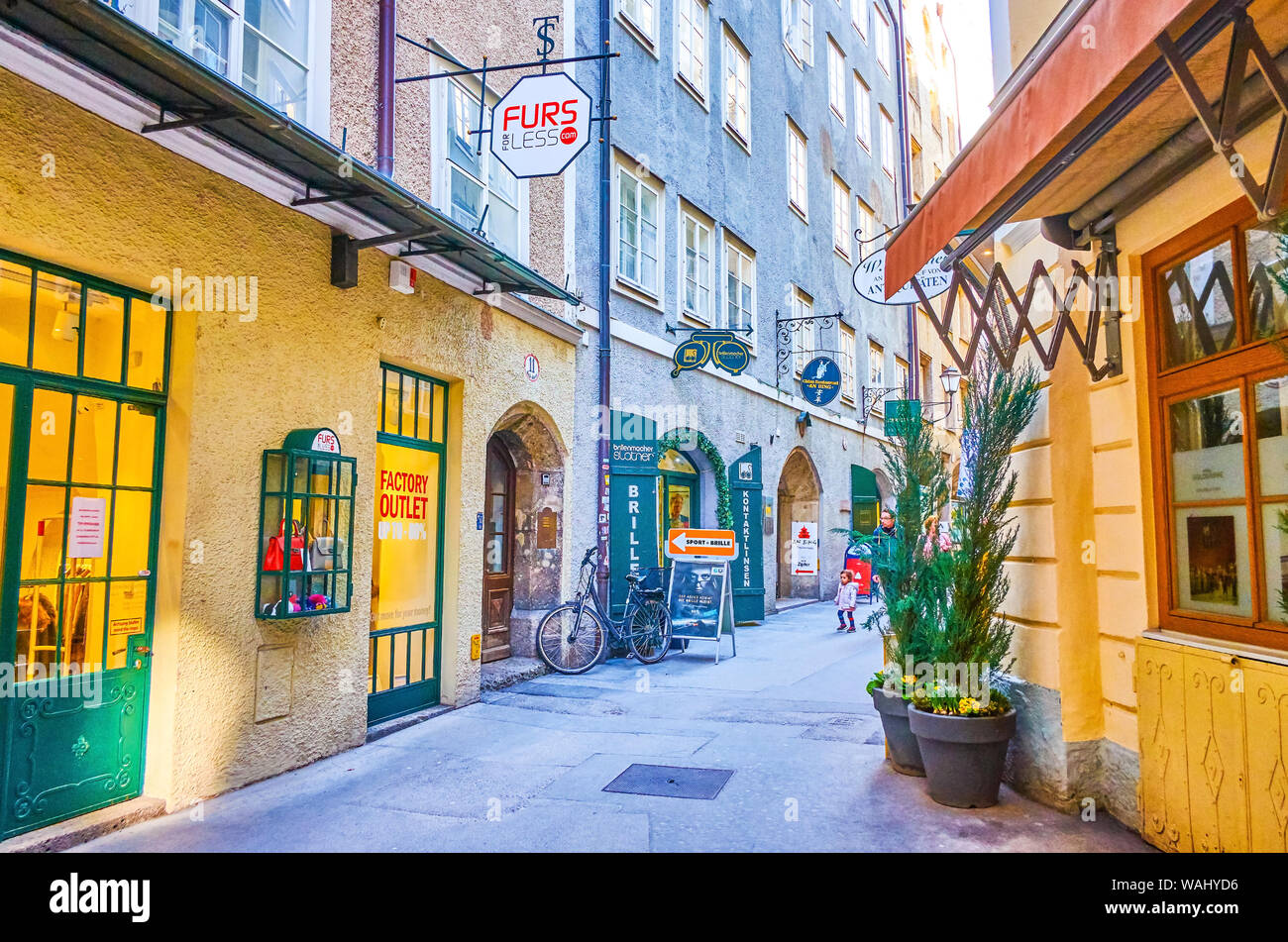 SALZBURG, AUSTRIA - FEBRUARY 27, 2019: Shopping area leads along all  streets in old town, and the greatest scope in medieval narrow streets,  such as G Stock Photo - Alamy