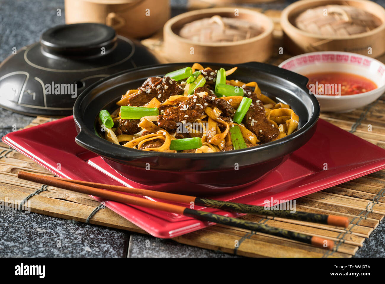Beef chow fun. Cantonese noodle stir fry. Chinese Food Stock Photo