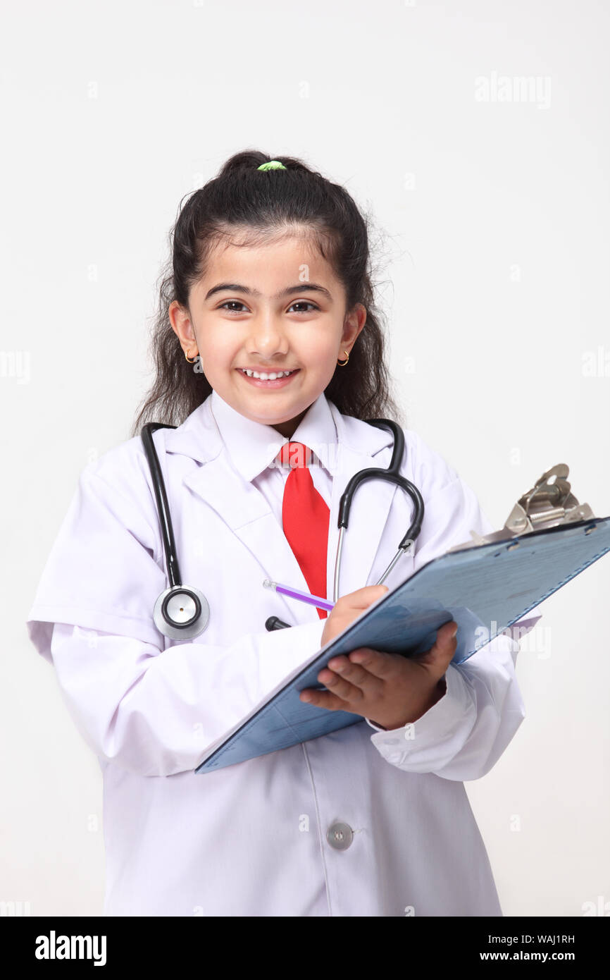 Girl pretending to be a doctor holding medical report Stock Photo Alamy