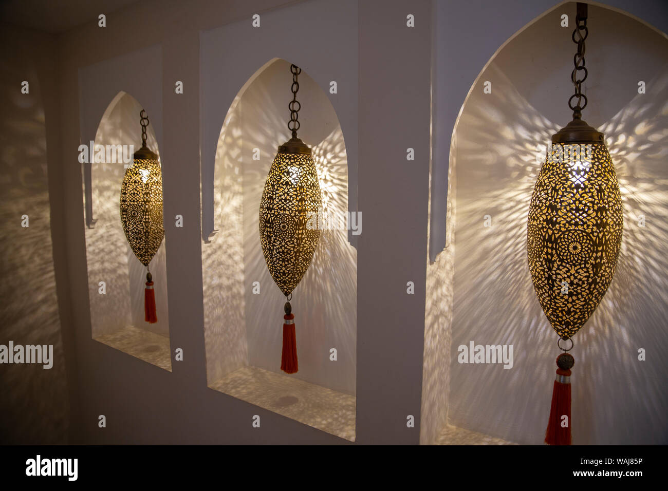 Marrakech, Morocco. Lit Moroccan hanging lanterns with tassels Stock Photo