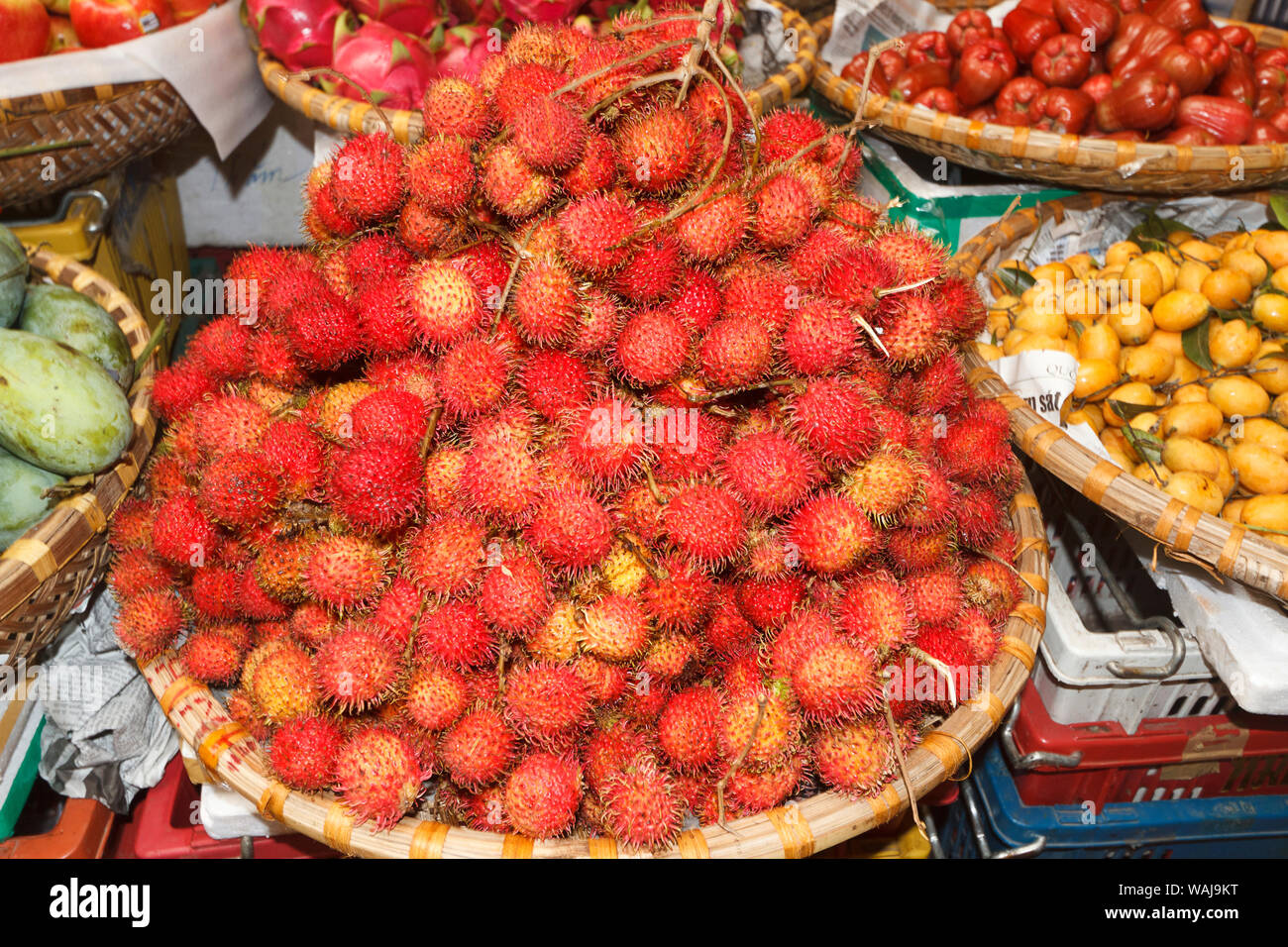 Hanoi, Vietnam. Rambutan, a lychee like fruit for sale in Hom Market in the 36 Streets area, part of the historic old city. Stock Photo