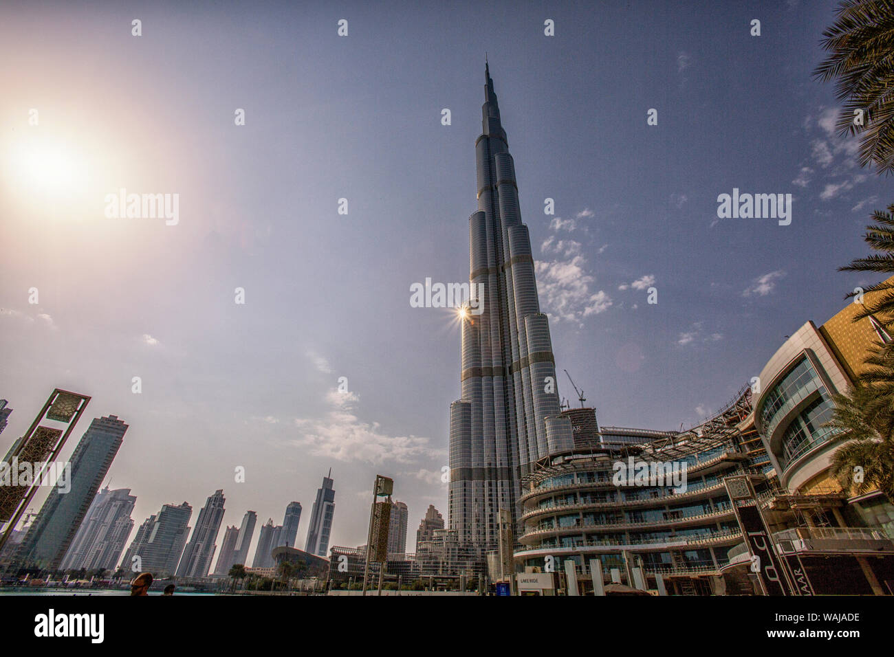 Sunburst from world's tallest building. 2,716.5 feet high with 160 stories. Burj Khalifa. Dubai, UAE. Stock Photo