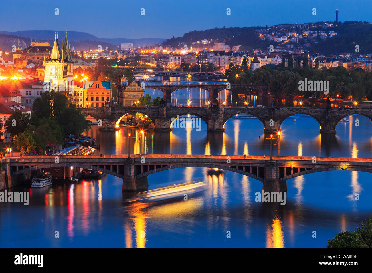 Europe, Czech Republic, Prague. Sunset on city and river bridges. Credit as: Jim Nilsen / Jaynes Gallery / DanitaDelimont.com Stock Photo