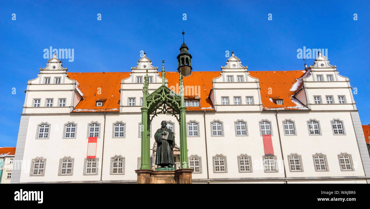 Martin Luther Statue, Colorful Market Square Rathaus, Lutherstadt Wittenberg, Germany. Statue from 1800's. Stock Photo