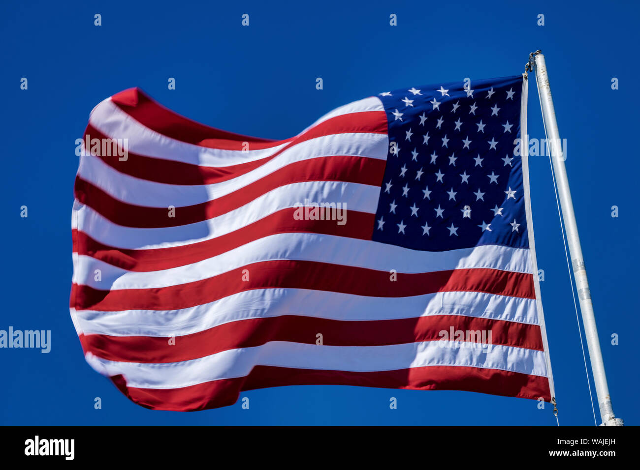 American flag blowing in the wind, USA Stock Photo