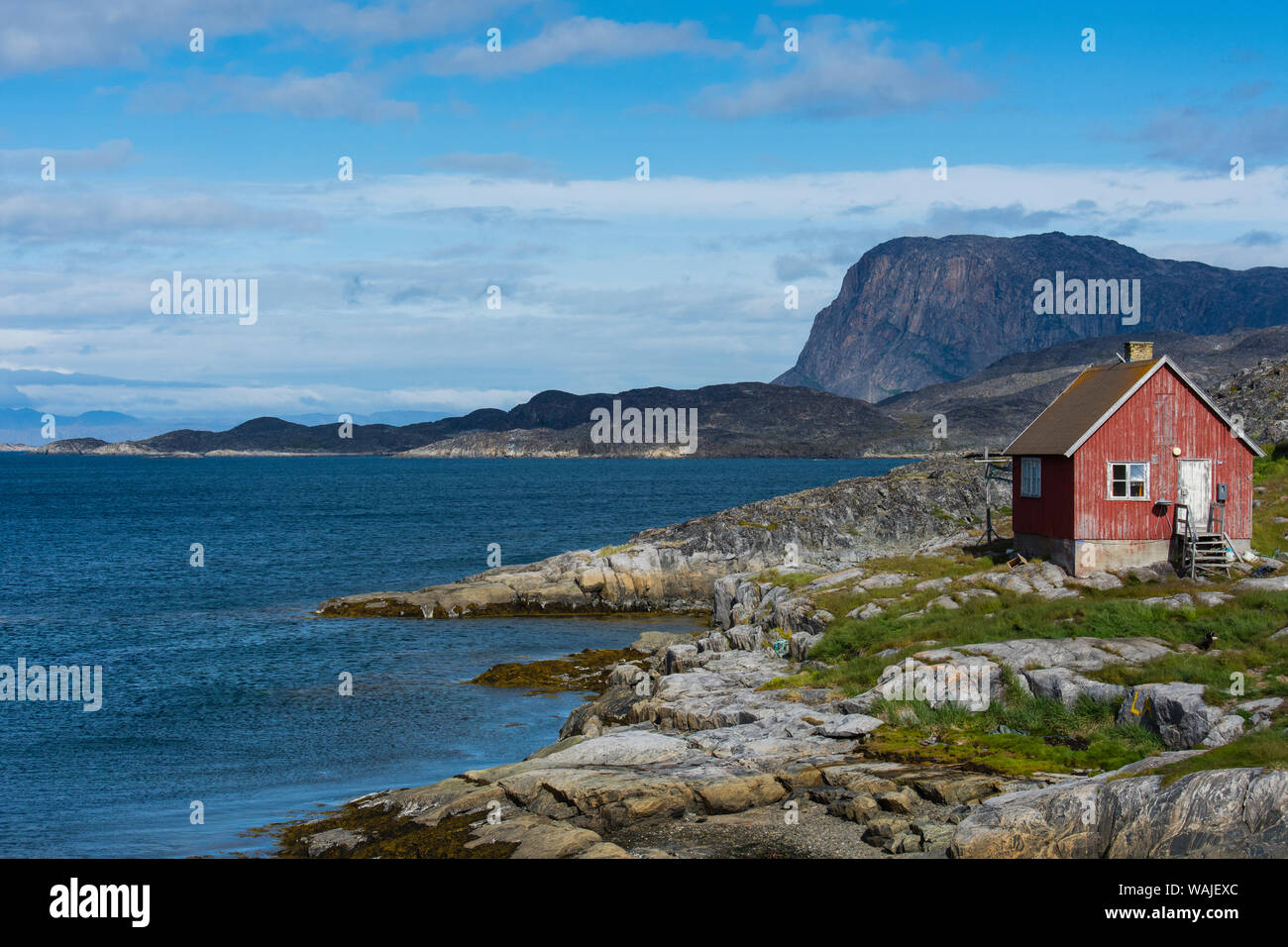 Greenland. Itilleq. Weather worn red house Stock Photo Alamy