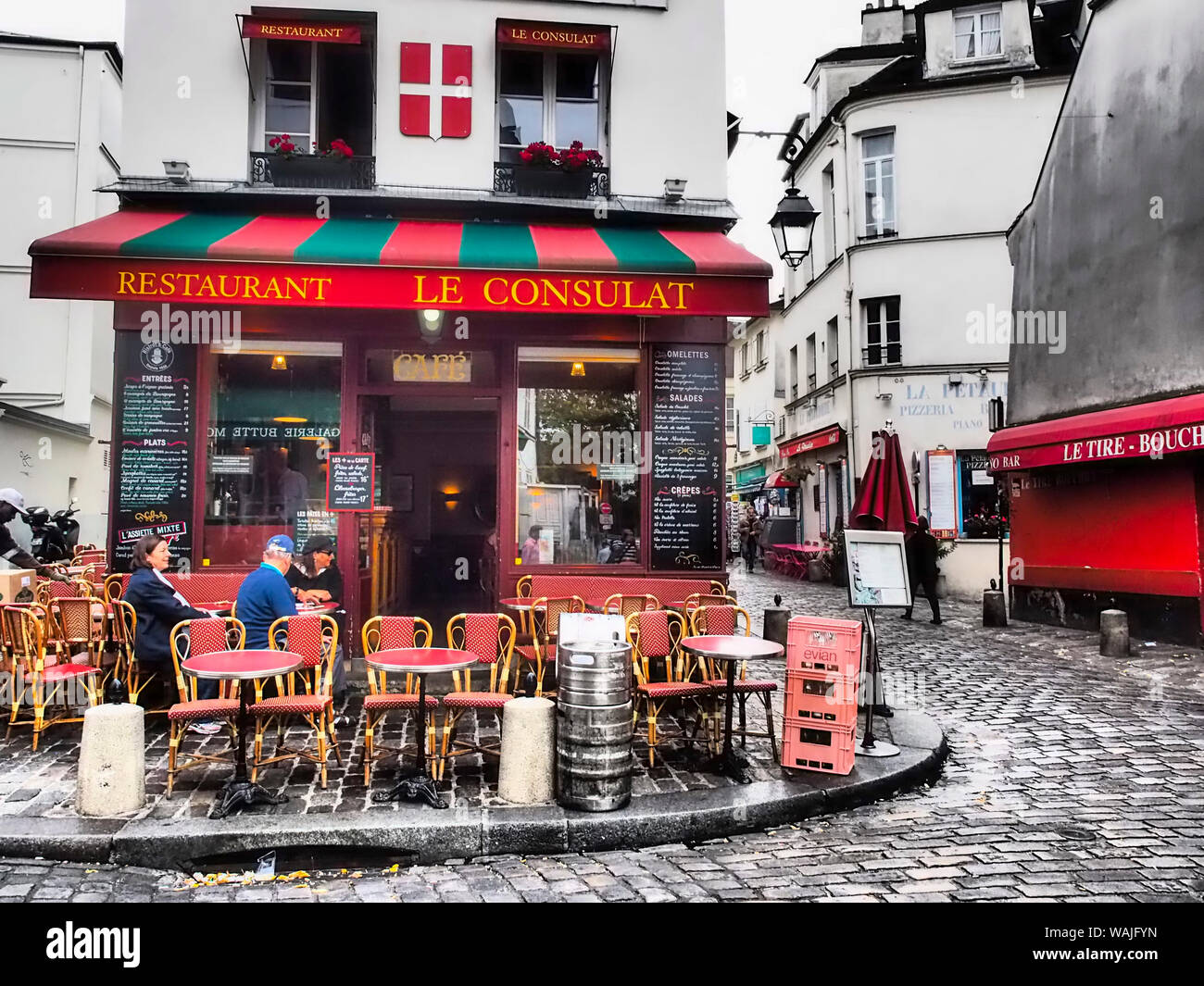 Evening light and restaurants, Montmartre region of Paris. Stock Photo