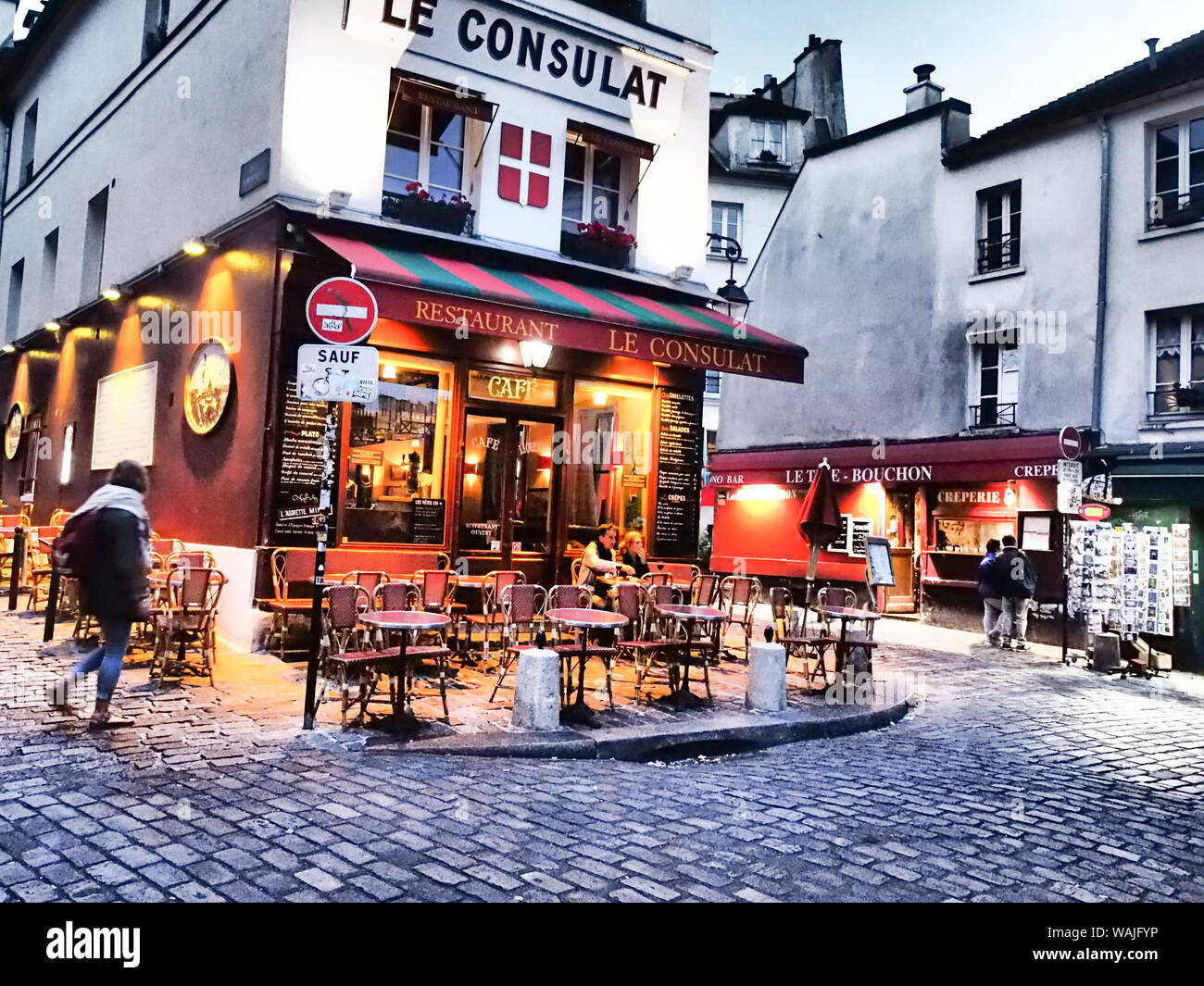 Evening light and restaurants, Montmartre region of Paris. Stock Photo