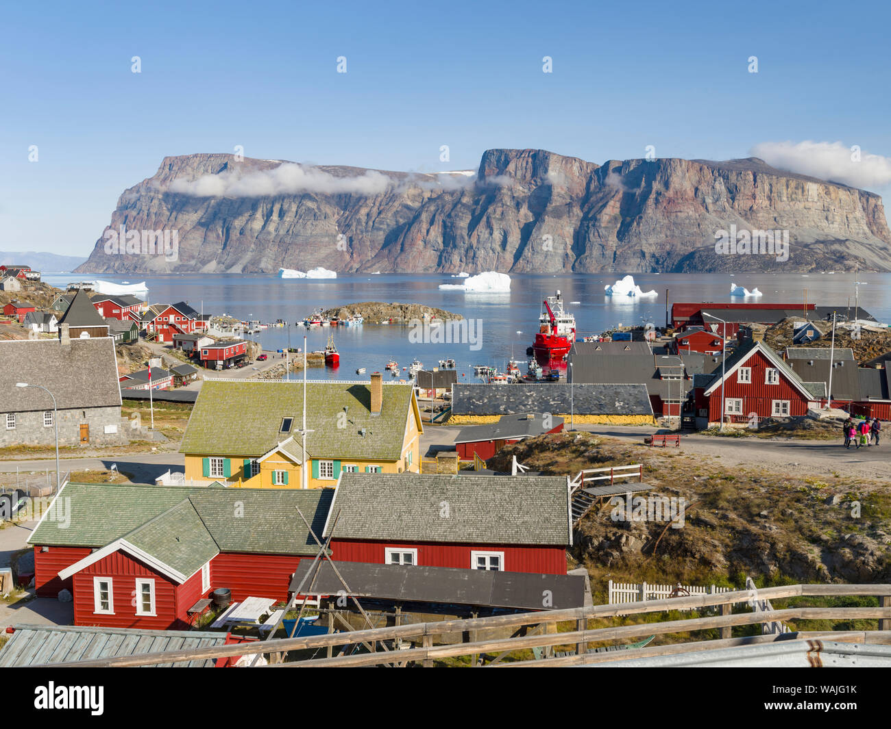 The harbor with typical fishing boats. Small town of Uummannaq, northwest Greenland. Stock Photo