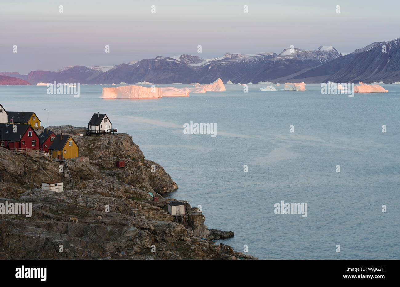 Small town of Uummannaq, northwest Greenland. Background the glaciated Nuussuaq (Nuussuaq) Peninsula. Stock Photo