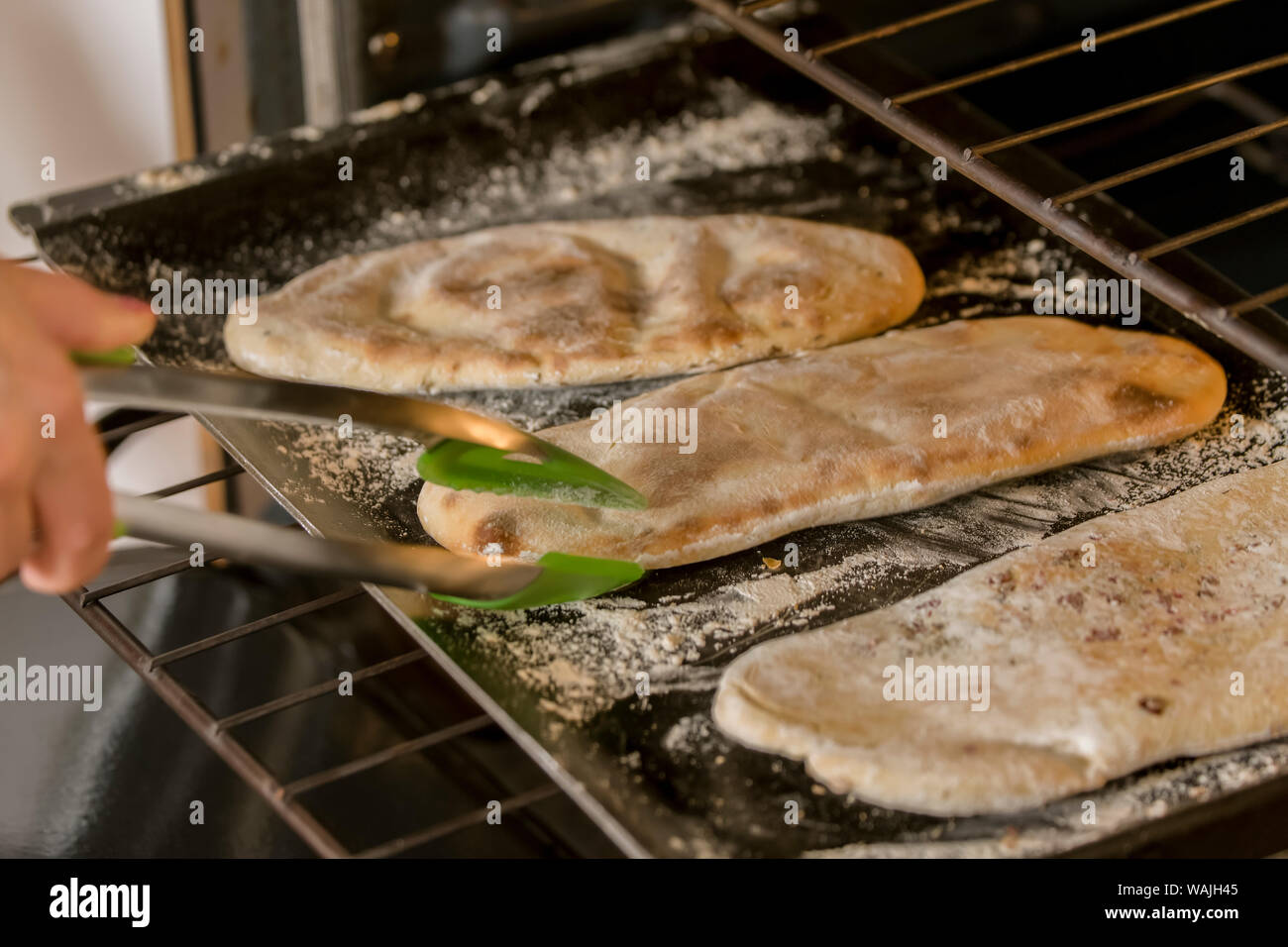 Baking naan in oven (MR Stock Photo Alamy Baking naan in oven (MR Stock Photo Alamy