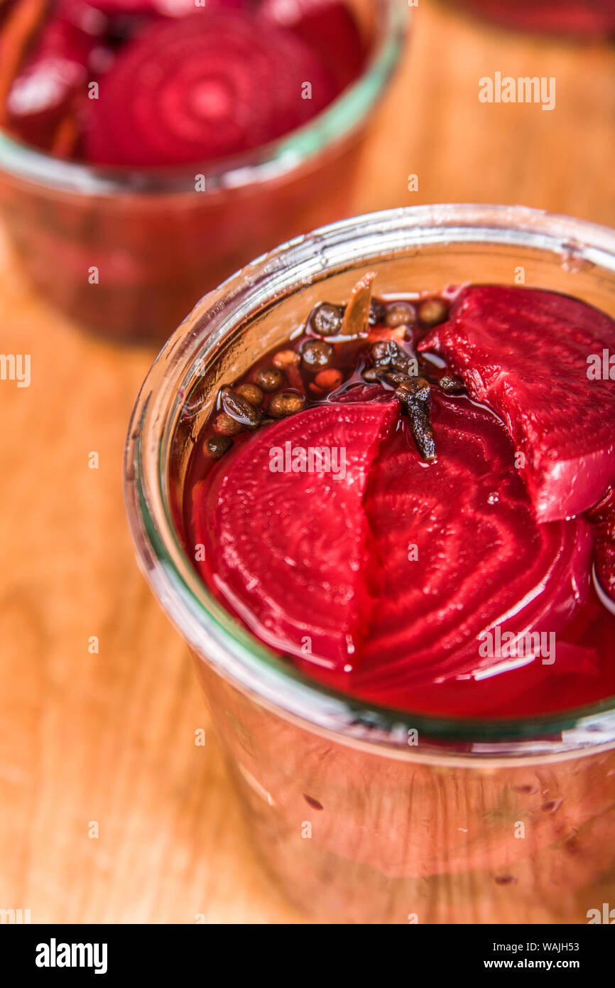 Weck jar of pickled beets with pickling solution in it, ready to have