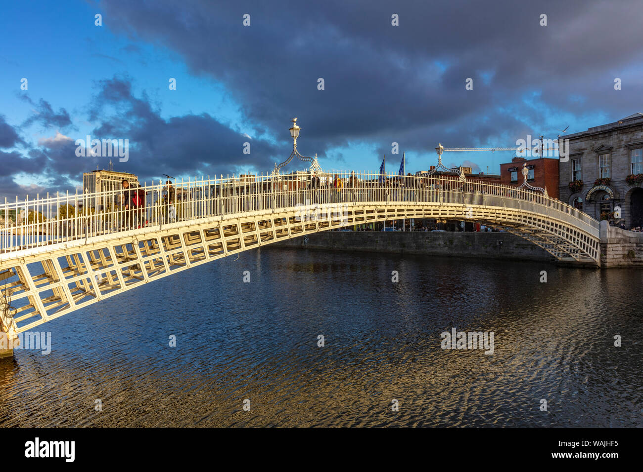 Historic Ha'penny walking bridge over the River Liffey in Dublin ...