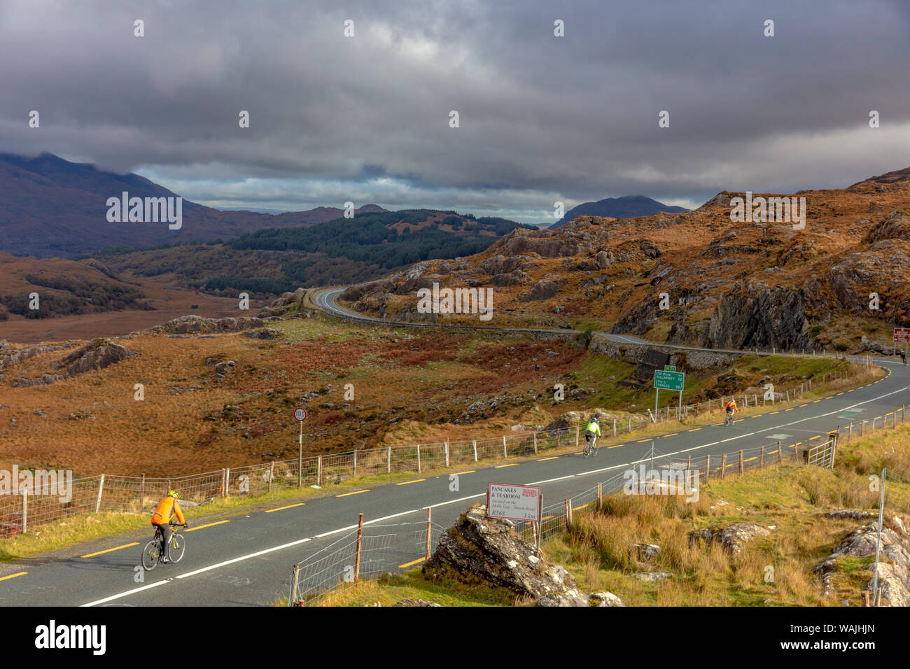 Road bicycling at Molls Gap in Killarney National Park, Ireland (Editorial Use Only) Stock Photo