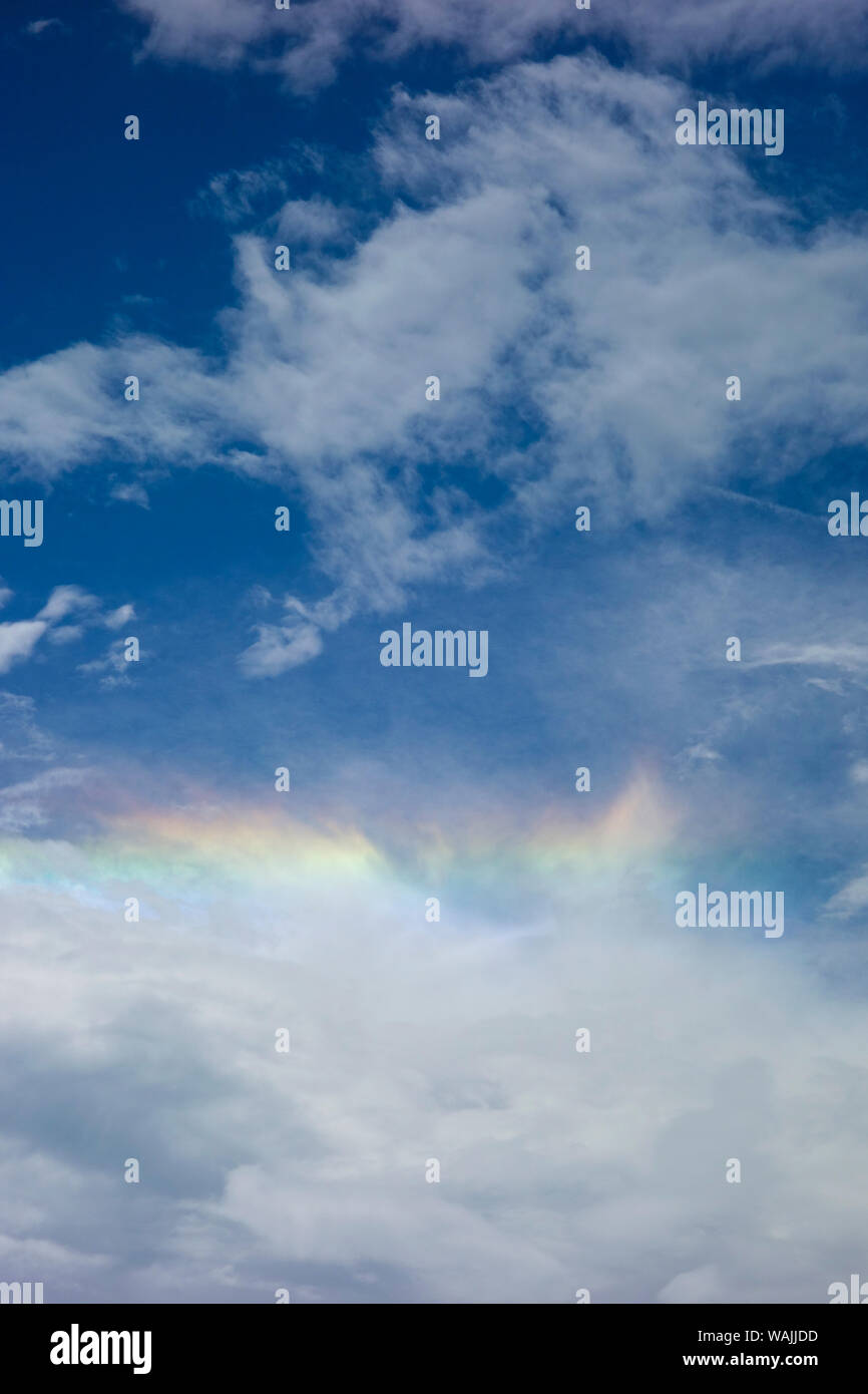 Partial rainbow on the edge of dramatic storm clouds Stock Photo Alamy