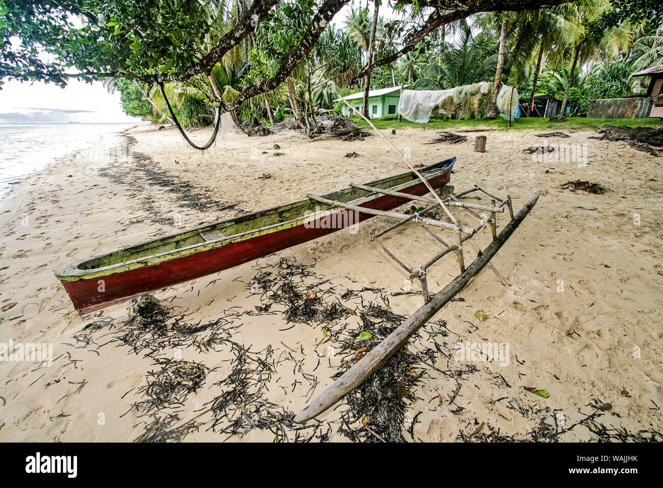 Walung, Kosrae, Micronesia. Traditional, hand carved outrigger canoe