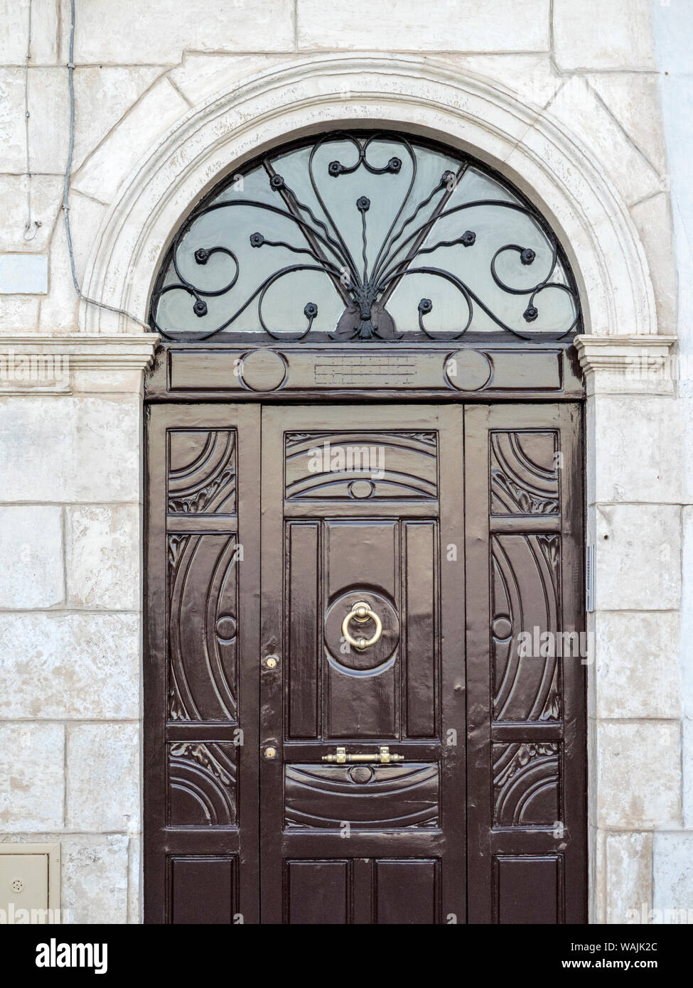 Italy Puglia Brindisi Itria Valley Ostuni Old Wooden Door With Wrought Iron Detail Design Above The Door Stock Photo Alamy
