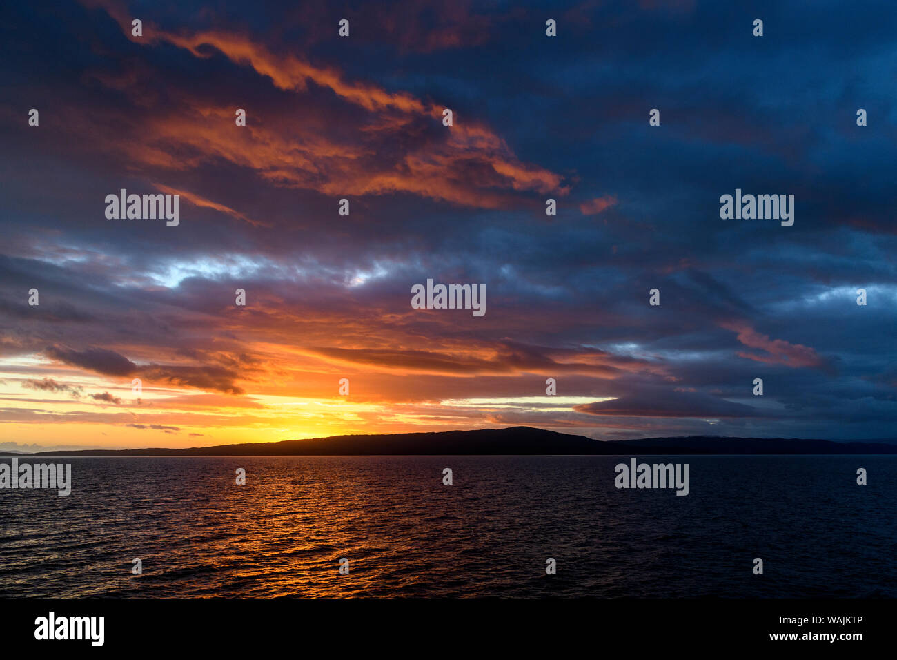 Argentina, Tierra del Fuego, Beagle Channel at sunset. Stock Photo