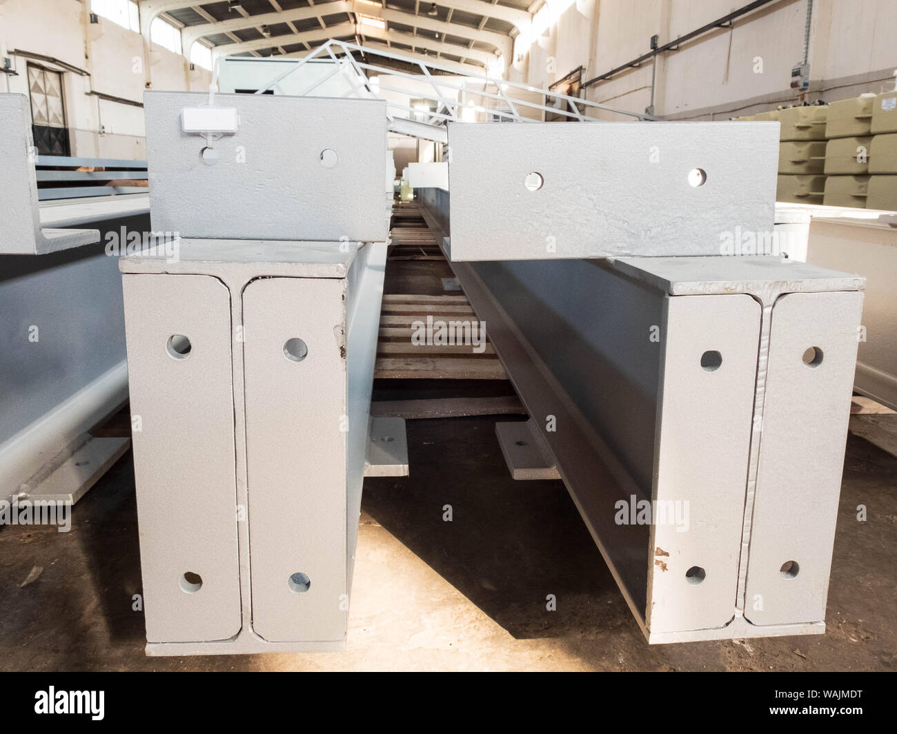 Stacked metal parts of a prefabricated building with blank copy space