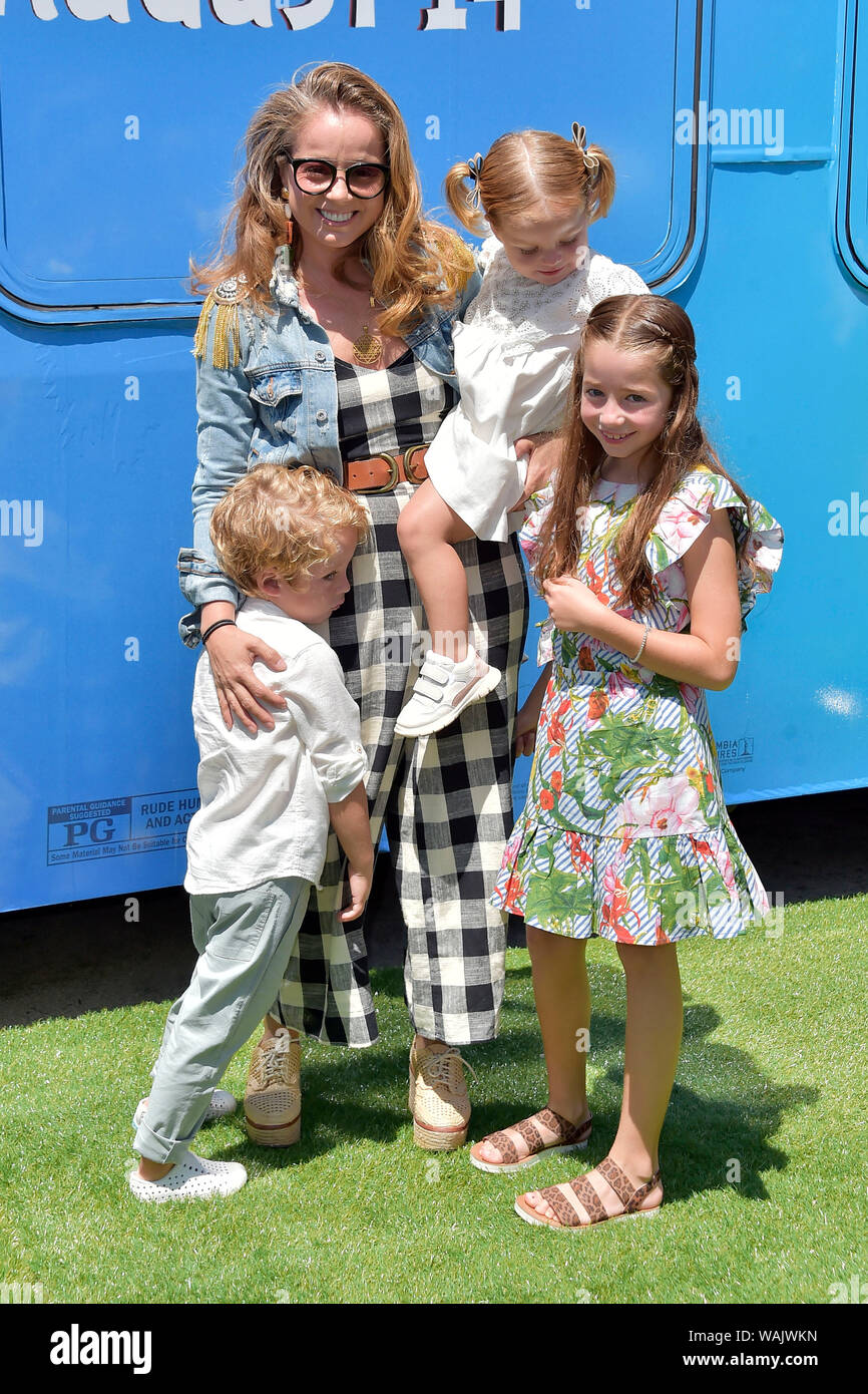 Marcela Valladolid and kids attending 'The Angry Birds Movie 2' premiere at the Westwood Regency Theater on August 10, 2019 in Los Angeles, California. Stock Photo