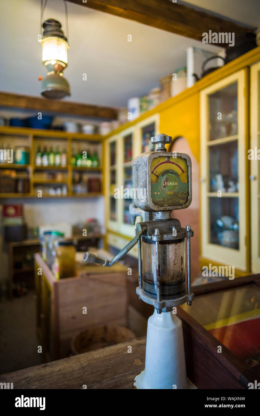Portugal, Azores, Sao Miguel Island, Capelas. Oficina-Museu M.J. Melo, ethnographic museum in the home of a collector of island life memorabilia, old heating oil pump in general store (Editorial Use Only) Stock Photo