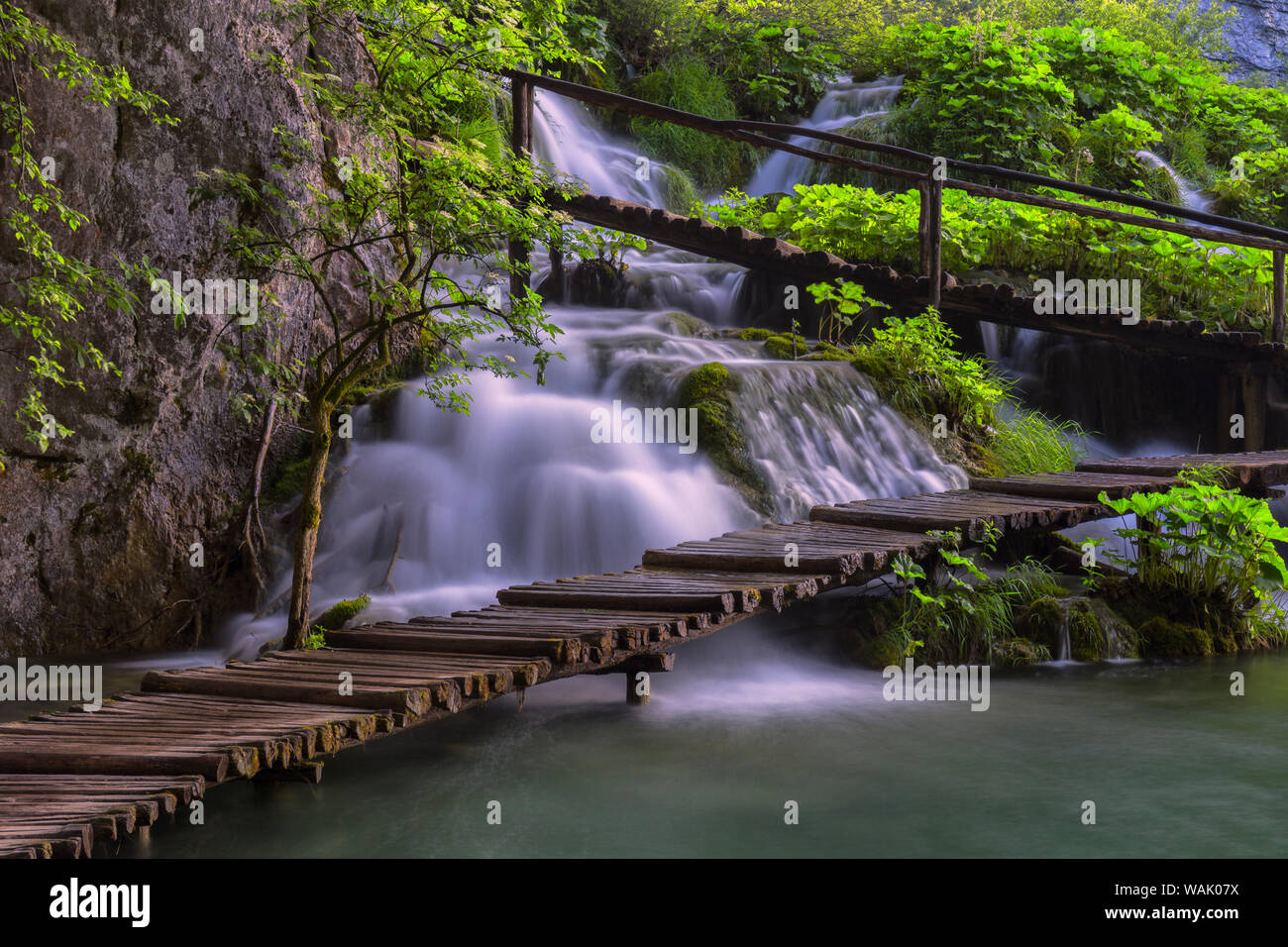 Croatia, Plitvice Lakes National Park. Scenic of waterfall and wooden walkway. Credit as: Jim Nilsen / Jaynes Gallery / DanitaDelimont.com Stock Photo