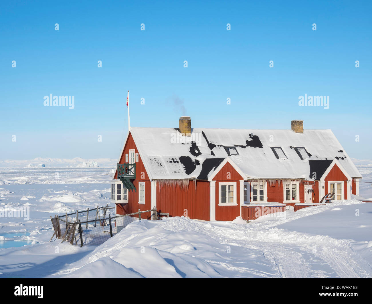 Sea ice in the frozen Disko Bay with icebergs. Greenland. (Editorial Use Only) Stock Photo