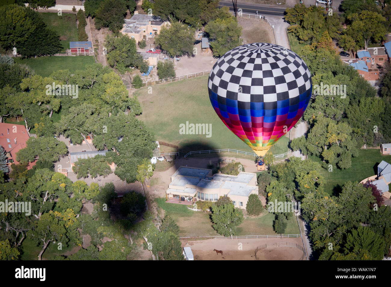 USA, New Mexico. Multicolored balloon floating over Albuquerque as part of the International Balloon Fiesta. Stock Photo