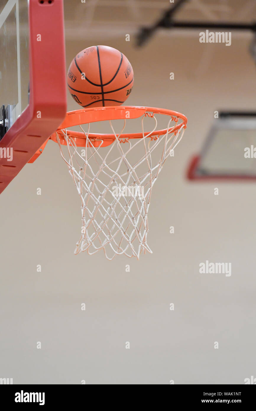 Basketball going through hoop hires stock photography and images Alamy