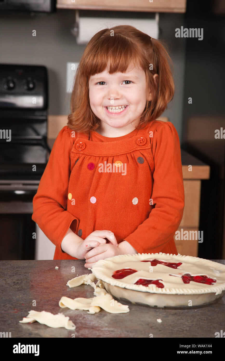 Girl with the cherry pie she helped make. (MR, PR) Stock Photo