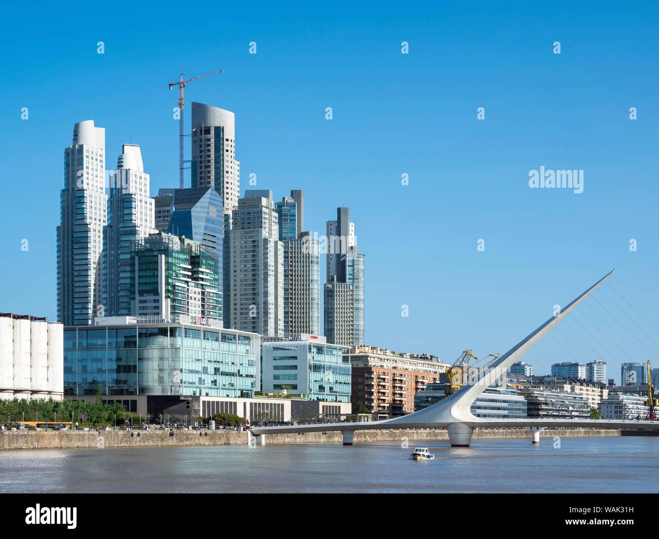 Puente de la Mujer, a rotating footbridge designed by architect Santiago  Calatrava. Puerto Madero, the modern living quarter around the old docks of Buenos  Aires. South America, Buenos Aires, Argentina Stock Photo -