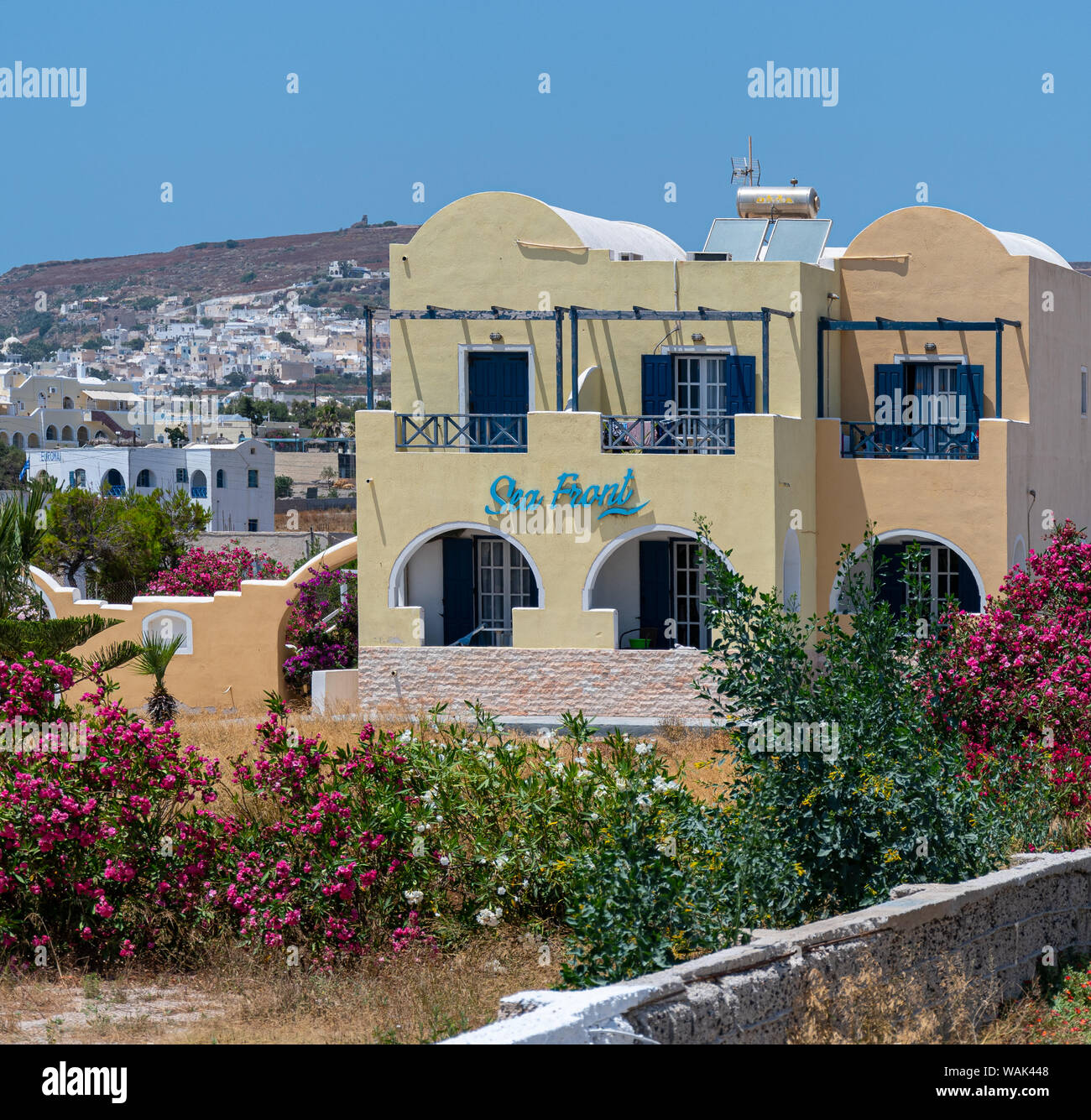 Perissa, Greece - July 11 2019:   The Sea Front holiday apartment building on the front at Perissa Stock Photo