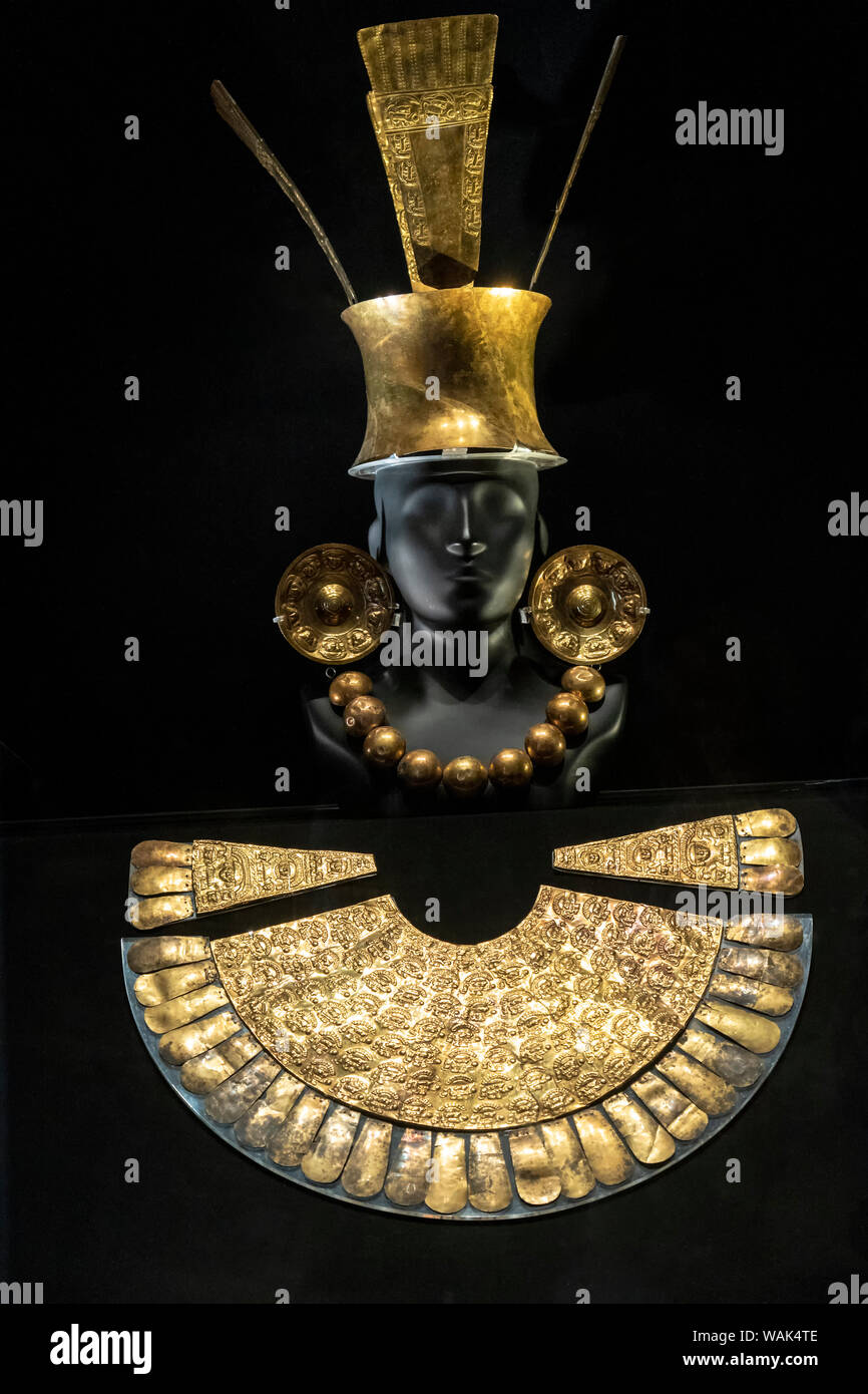 Lima, Peru. Gold Funerary Offering at the Larco Museum (Museo Arqueologico Rafael Larco Herrera). Complete set of gold Chimu clothing. Chimu Imperial Epoch (1300-1532 AD). (Editorial Use Only) Stock Photo