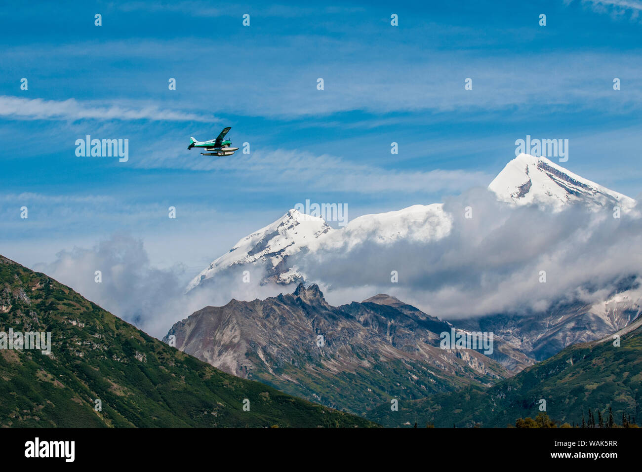 Floatplane and Mount Redoubt, Lake Clark National Park and Preserve, Alaska, USA. (Editorial Use Only) Stock Photo