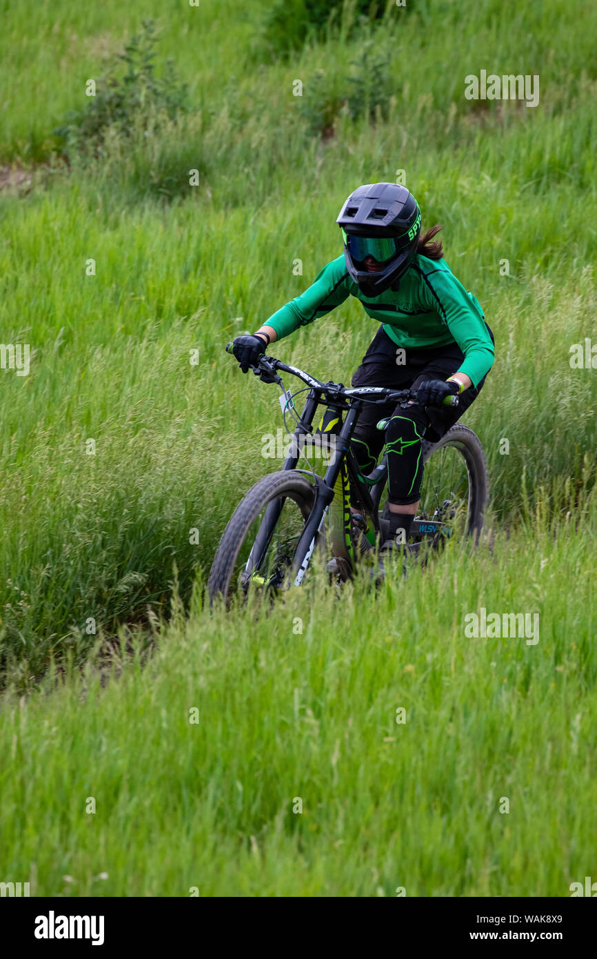Biking on a downhill trail. (Editorial Use Only) Stock Photo