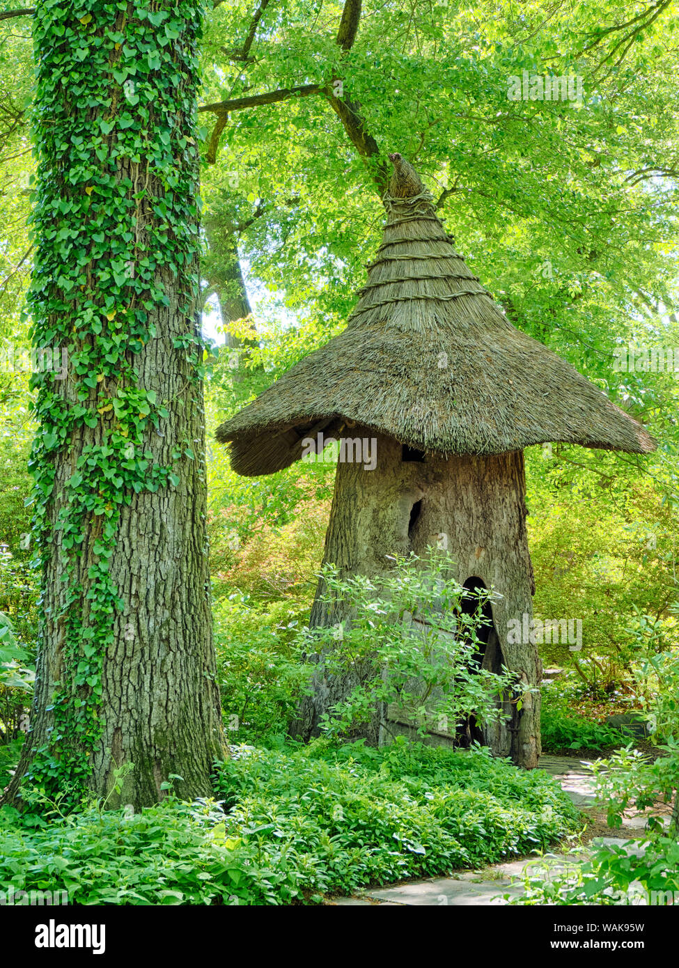 USA, Delaware. Witch's Hat House on garden grounds. Stock Photo