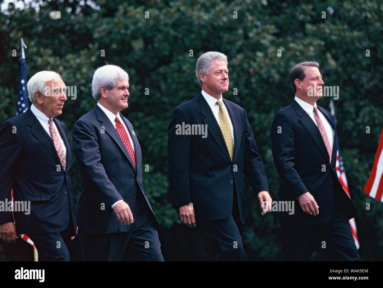 August 05, 1997. Washington, D.C. President Clinton walks to table on the South Lawn of the White House to sign a bill on a balanced budget. (left to right: Senator Frank Lautenberg, Speaker Newt Gingrich, President Clinton, VP Al Gore) Stock Photo