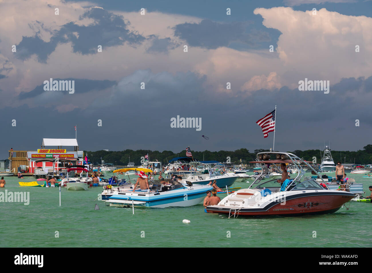 Boaters and food stands floating on the water to celebrate Billy Bowl Legs in Fort Walton Beach, Florida Stock Photo