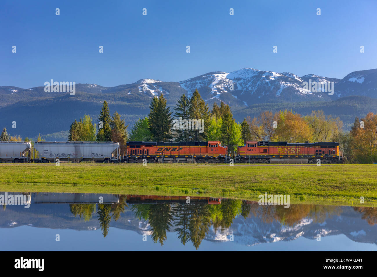 Burlington Northern freight train coming into Whitefish, Montana, USA Stock Photo