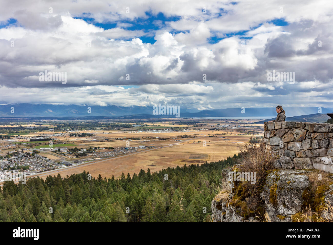 Taking in the view of Kalispell and Flathead Valley from overlook at Lone Pine State Park in Kalispell, Montana, USA (MR) Stock Photo