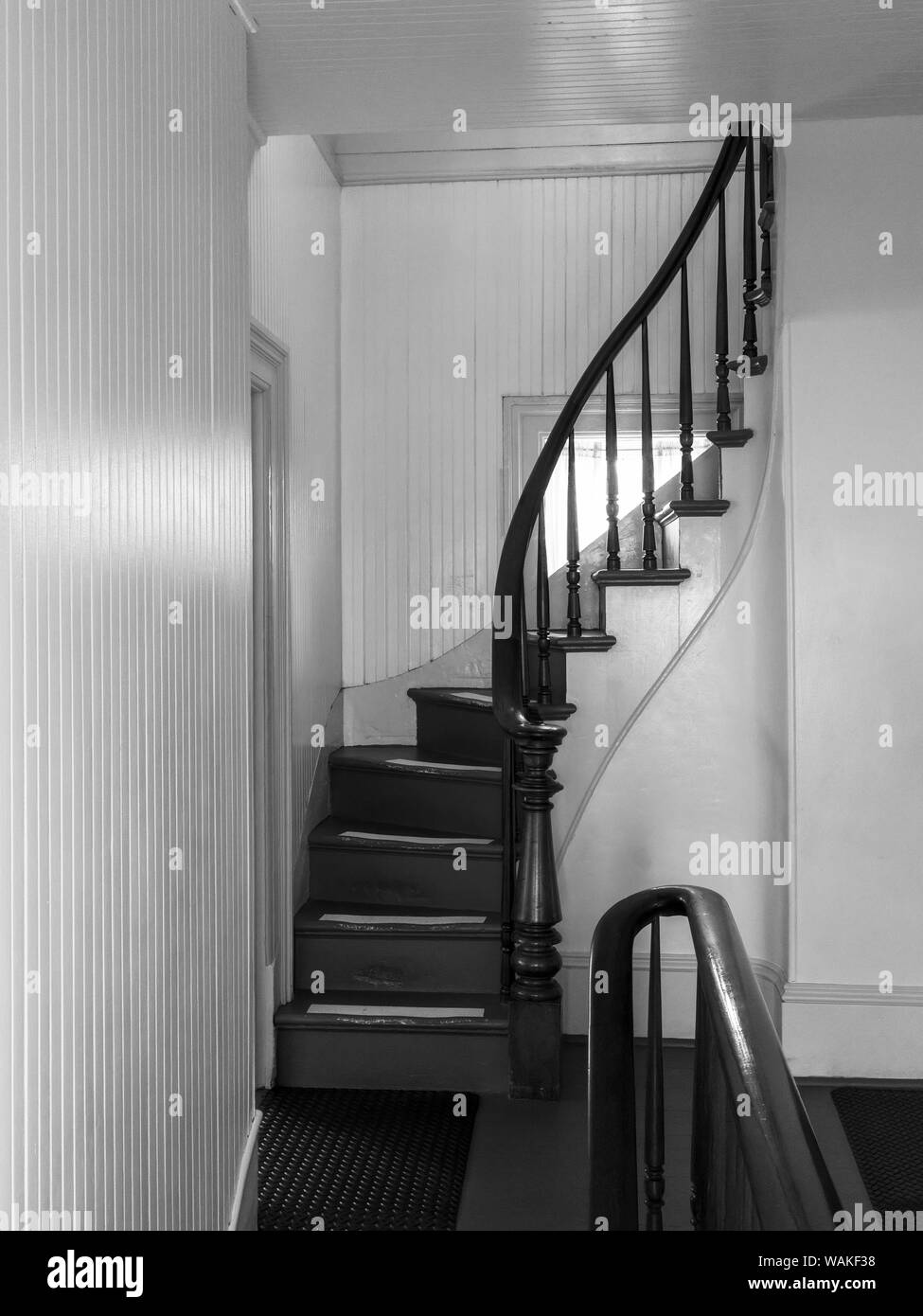 USA, Oregon, Newport. Black and white of stairs in lighthouse keeper's quarters. Credit as: Wendy Kaveney / Jaynes Gallery / DanitaDelimont.com Stock Photo