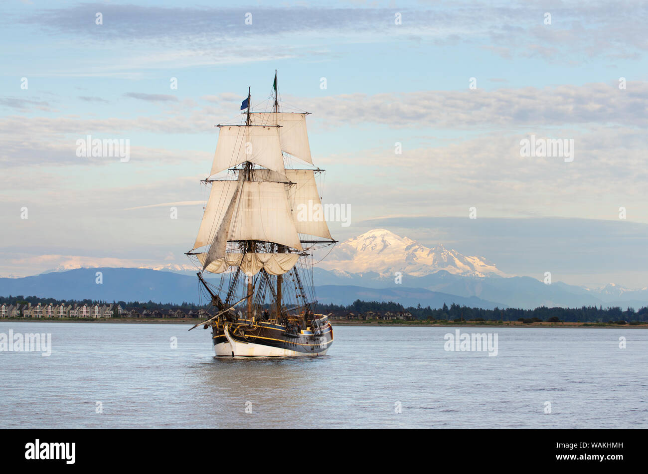 Lady Washington sailing in Semiahmoo Bay, Washington State. Mount Baker is in the distance. A historic replica of the original 18th Century brig. Stock Photo