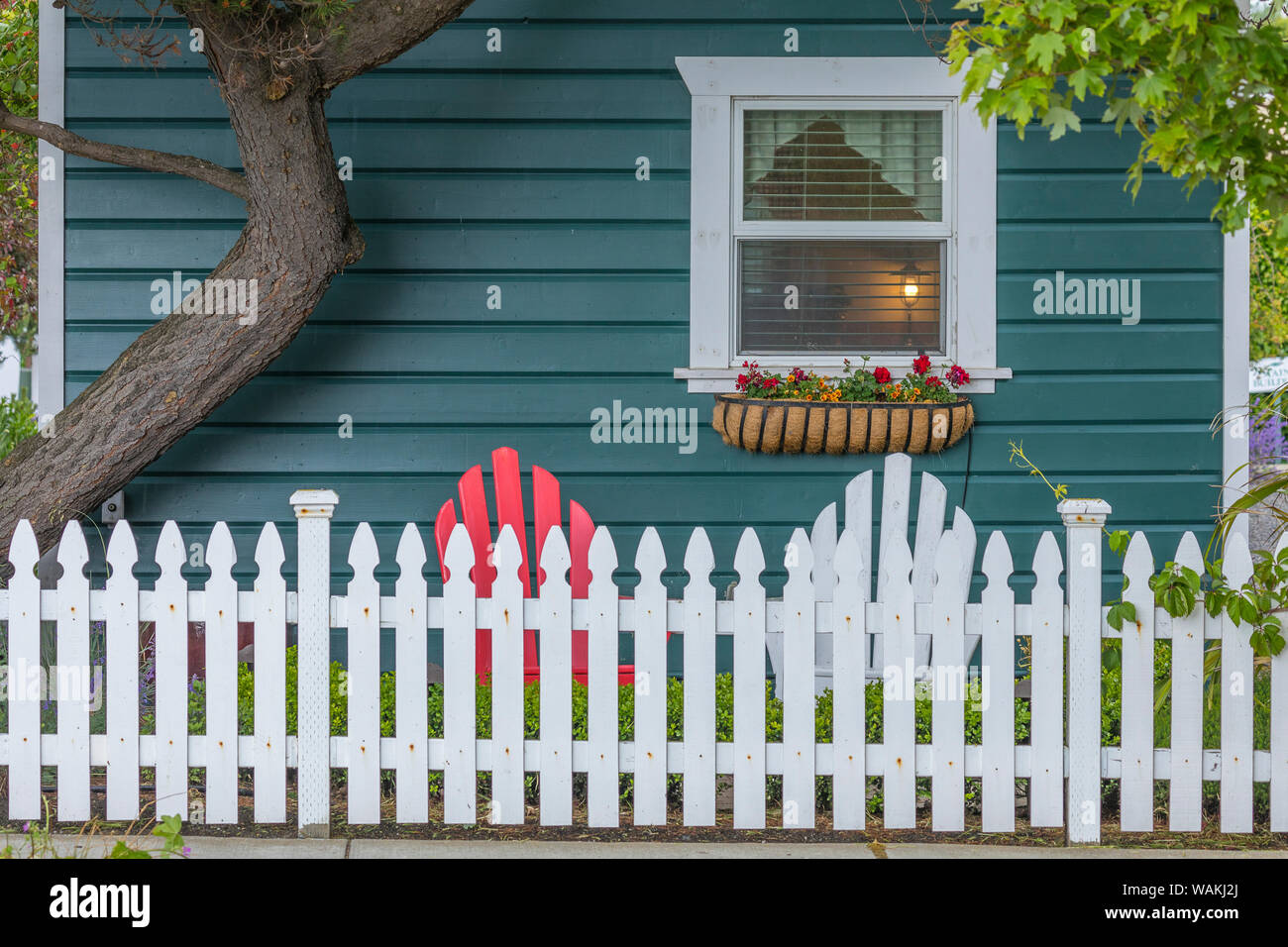 USA, Washington State, Port Townsend. Cottage and picket fence. Credit as: Don Paulson / Jaynes Gallery / DanitaDelimont.com Stock Photo