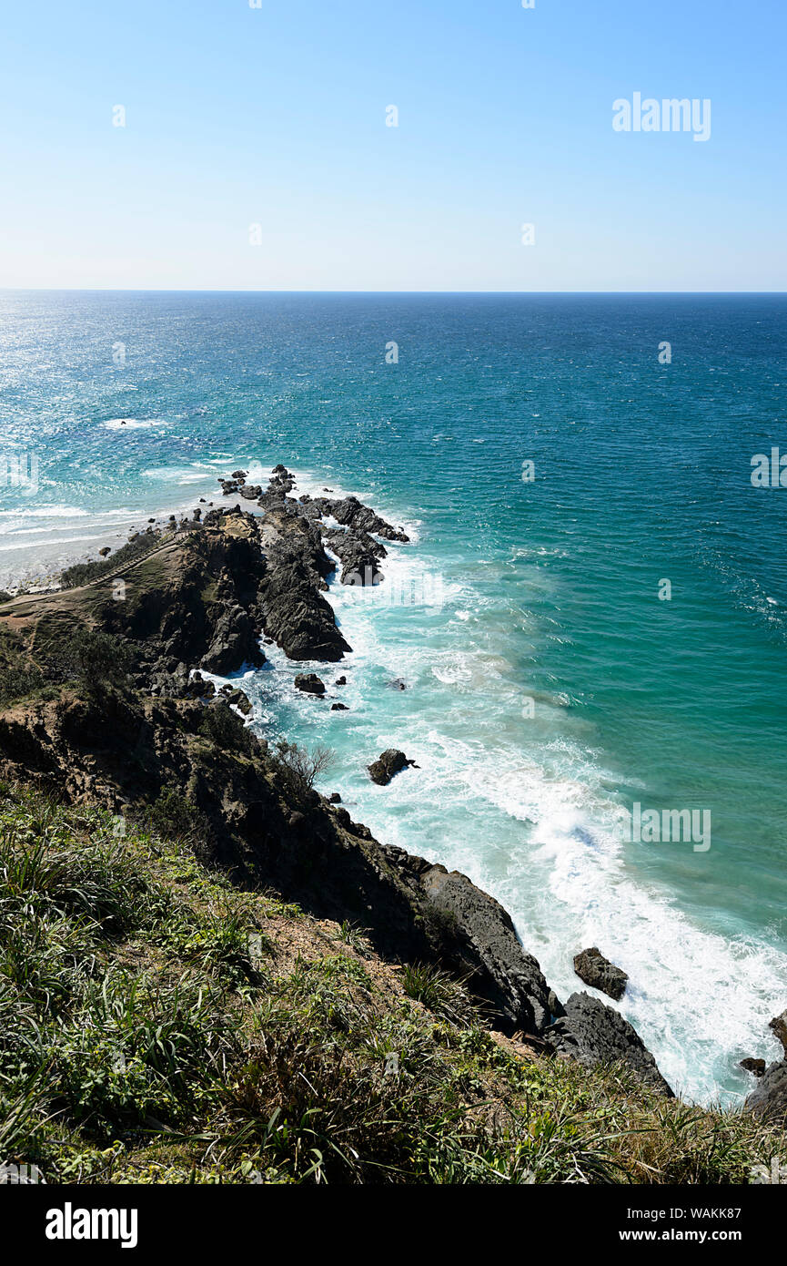 Vertical picturesque view of the rugged coastline at The Pass at Cape Byron, New South Wales, NSW, Australia Stock Photo